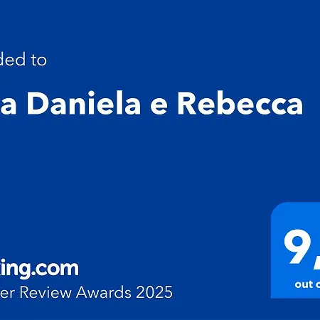 Daniela E Rebecca *